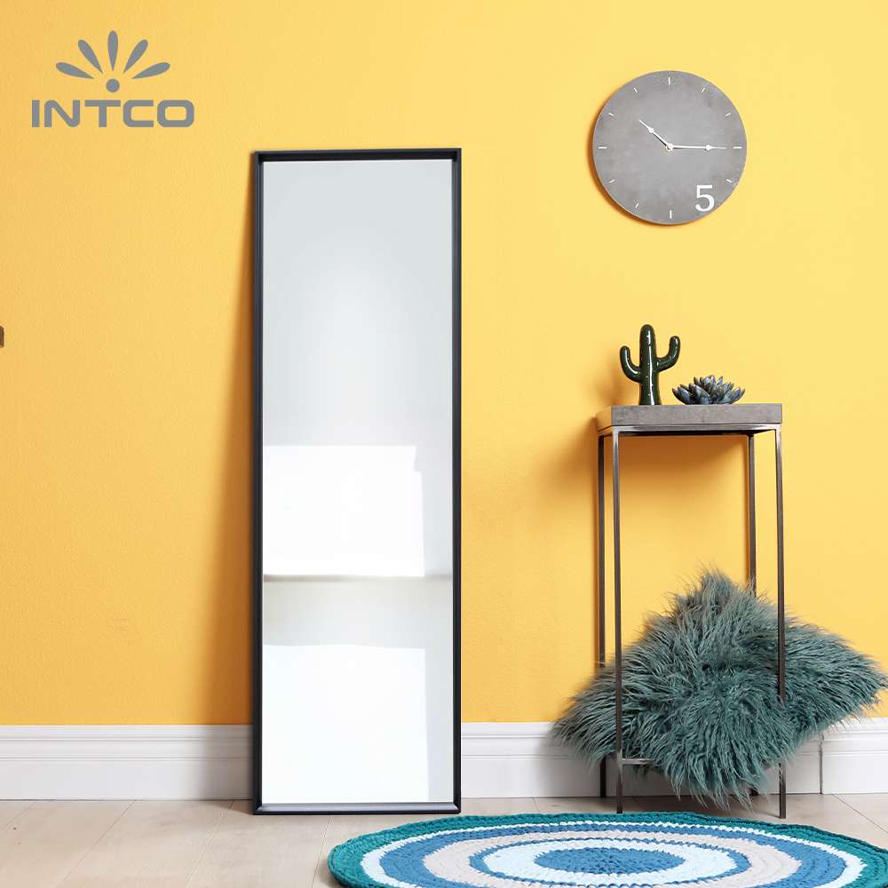Intco black decorative floor mirror brings style and function to your indoor space